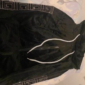 I’m selling this super cute blinged black zip up jacket